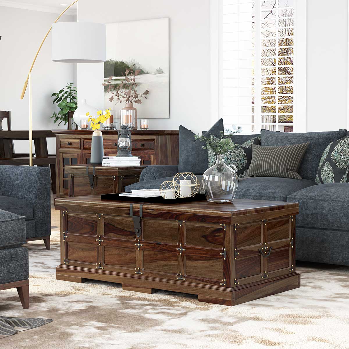 Antique wood trunk or chest used as a coffee table in a living area.  Beautiful! Rustic farmho…